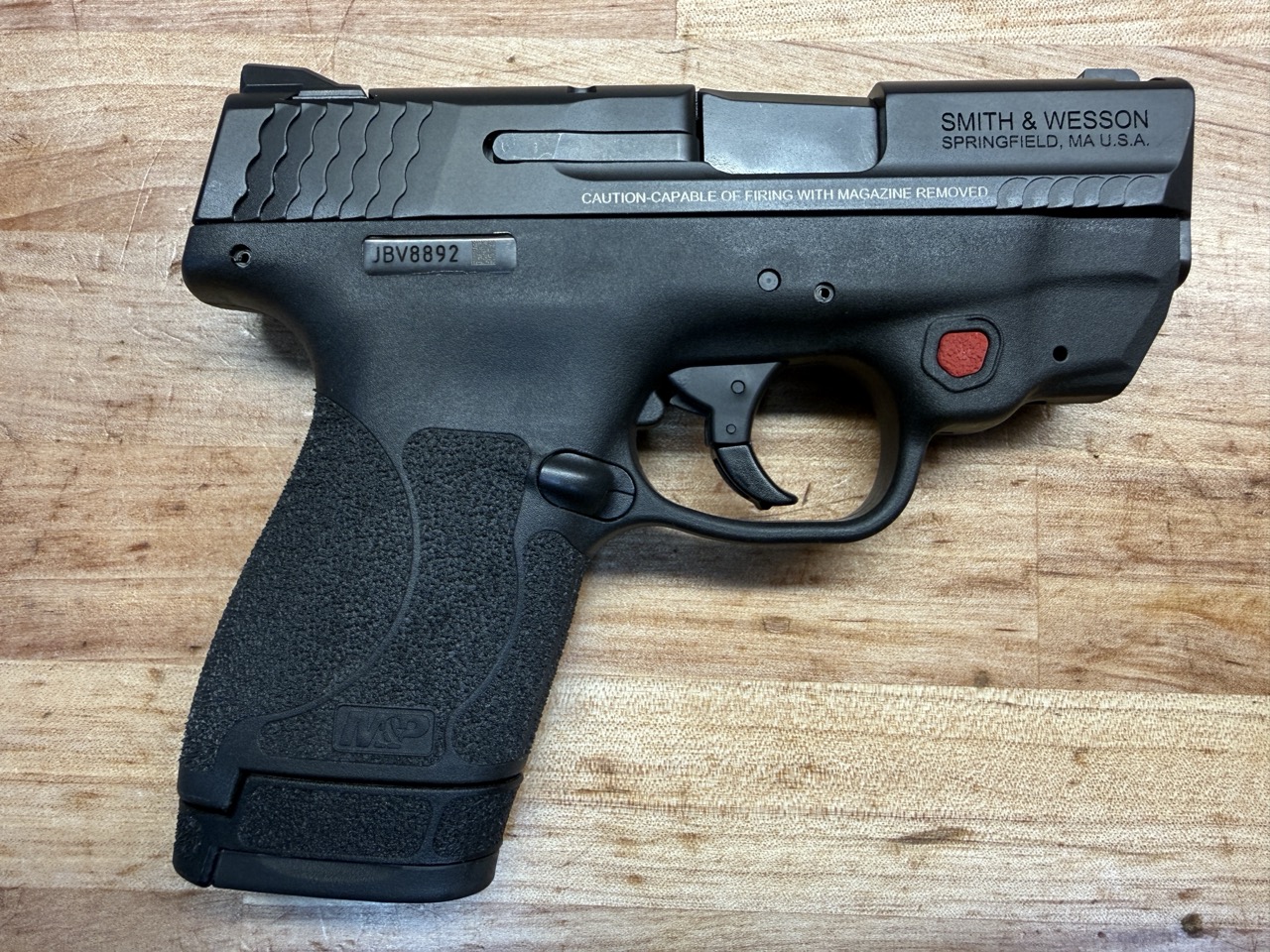PRE-OWNED SMITH AND WESSON M&P SHIELD 9 WITH LASER.